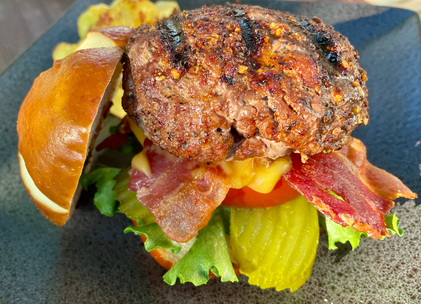 Holy Heifer BBQ Rub on burgers, Signature beef rub with Texas-style spice and sear.