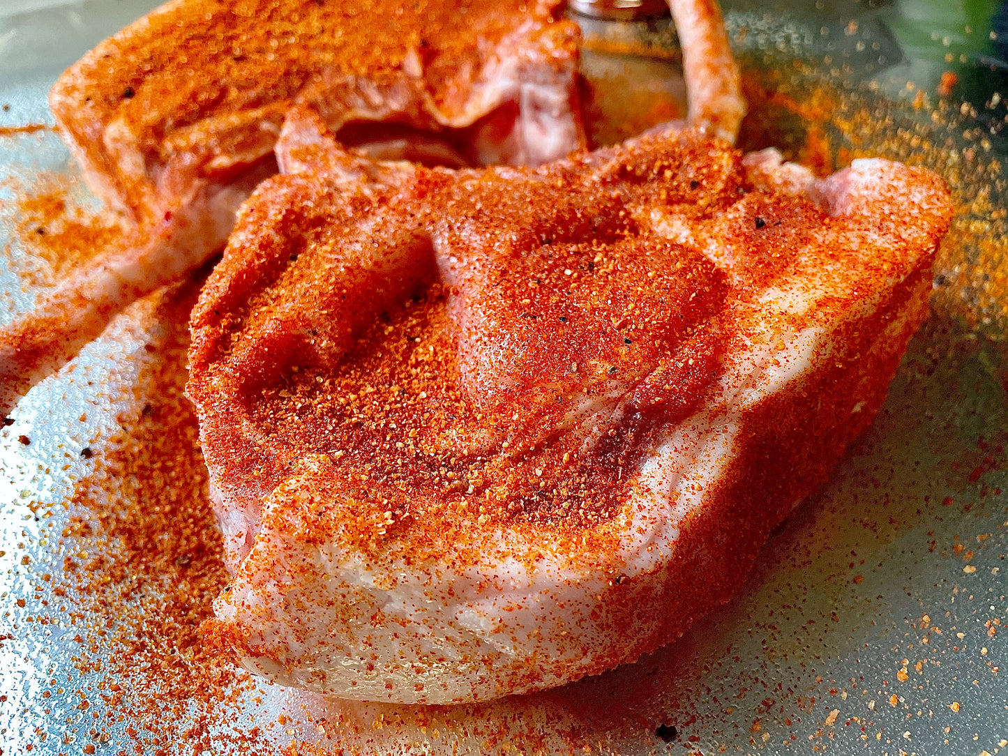 Apple Chipotle Pork Chops smoked low and slow for a fruity twist to any pork, beef, veggies, fish and more.