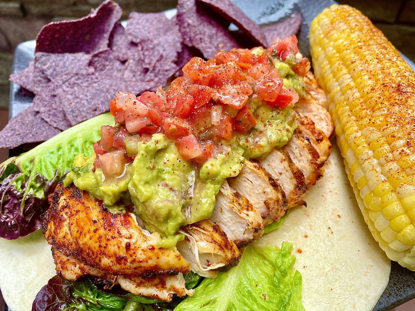 Chili Lime Corn and Chili Lime chicken grilled to perfection with holy smokers Diablito Chili Lime seasoning.