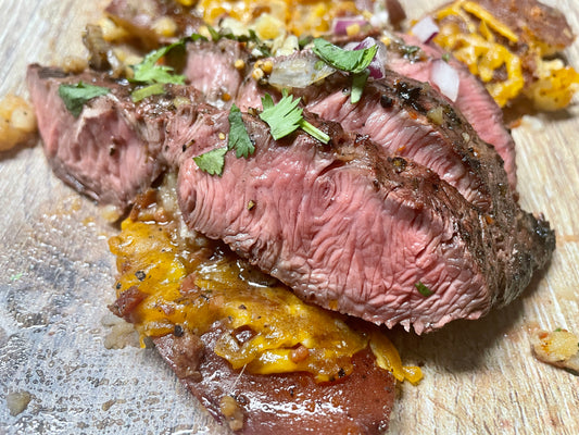 Our easy to make flat iron steak and bacon cheesy taters