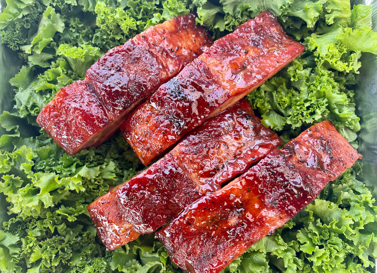 World champion competition BBQ pork ribs seasoned with Holy Smokers award-winning BBQ rubs (Smoked Apple Whisky seasoning)- perfectly smoked ribs for backyard pit masters and competition BBQ teams.