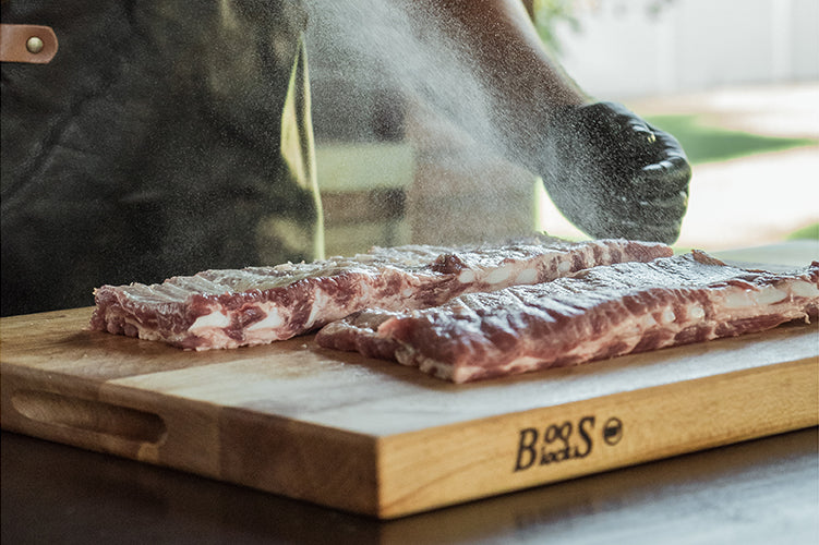 St. Louis style pork ribs seasoned with Holy Smokers Honey Bacon Hog rub - award-winning BBQ seasoning for the best smoked St. Louis ribs recipe every backyard pit master needs